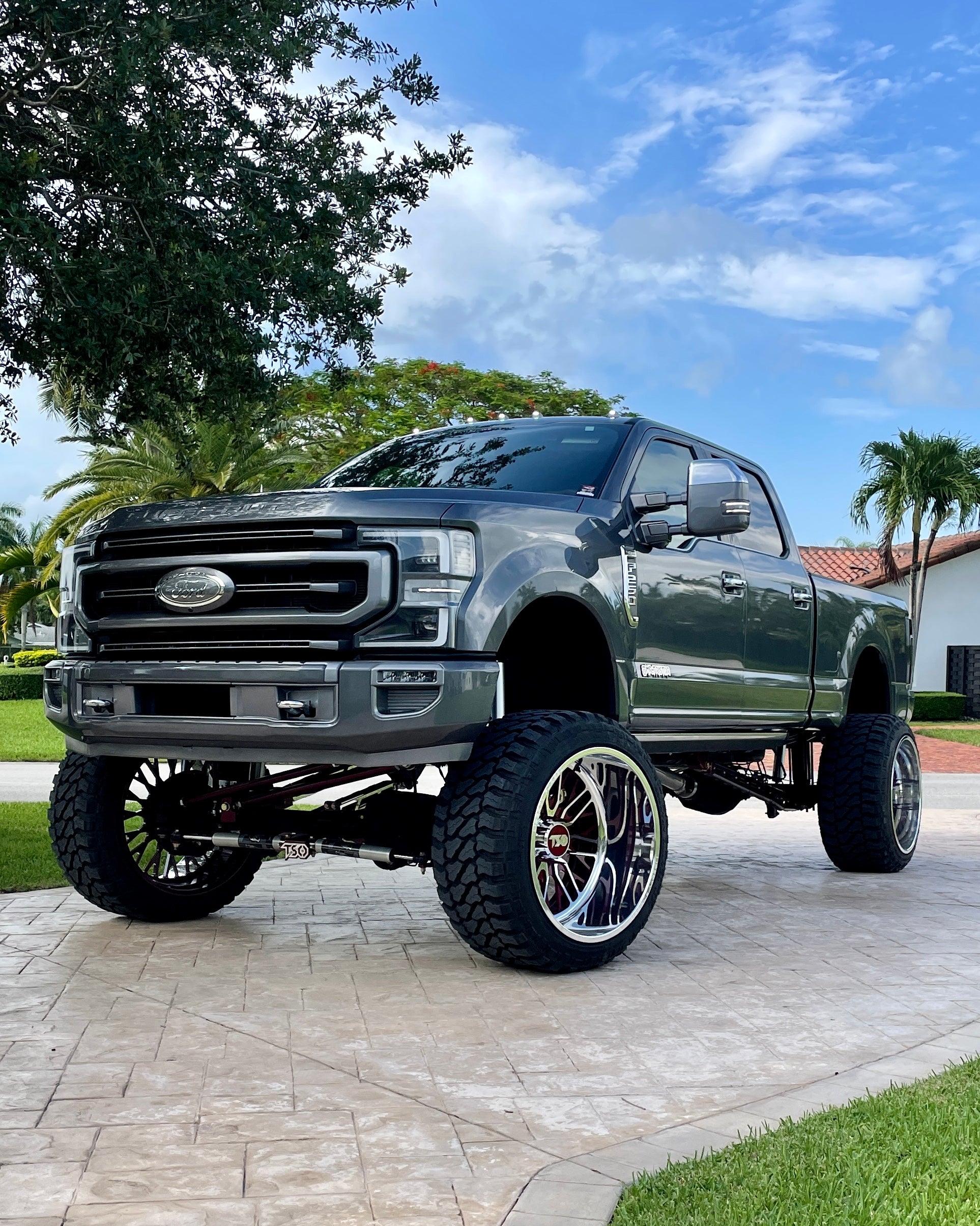 2022 Ford F250 Limited on a Custom 12 inch TSO lift kit and 26x16 forged wheels